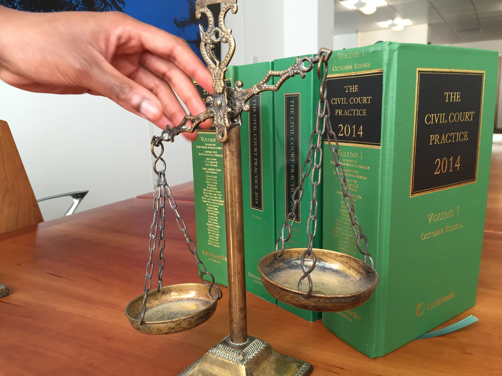 Law books and scales of justice